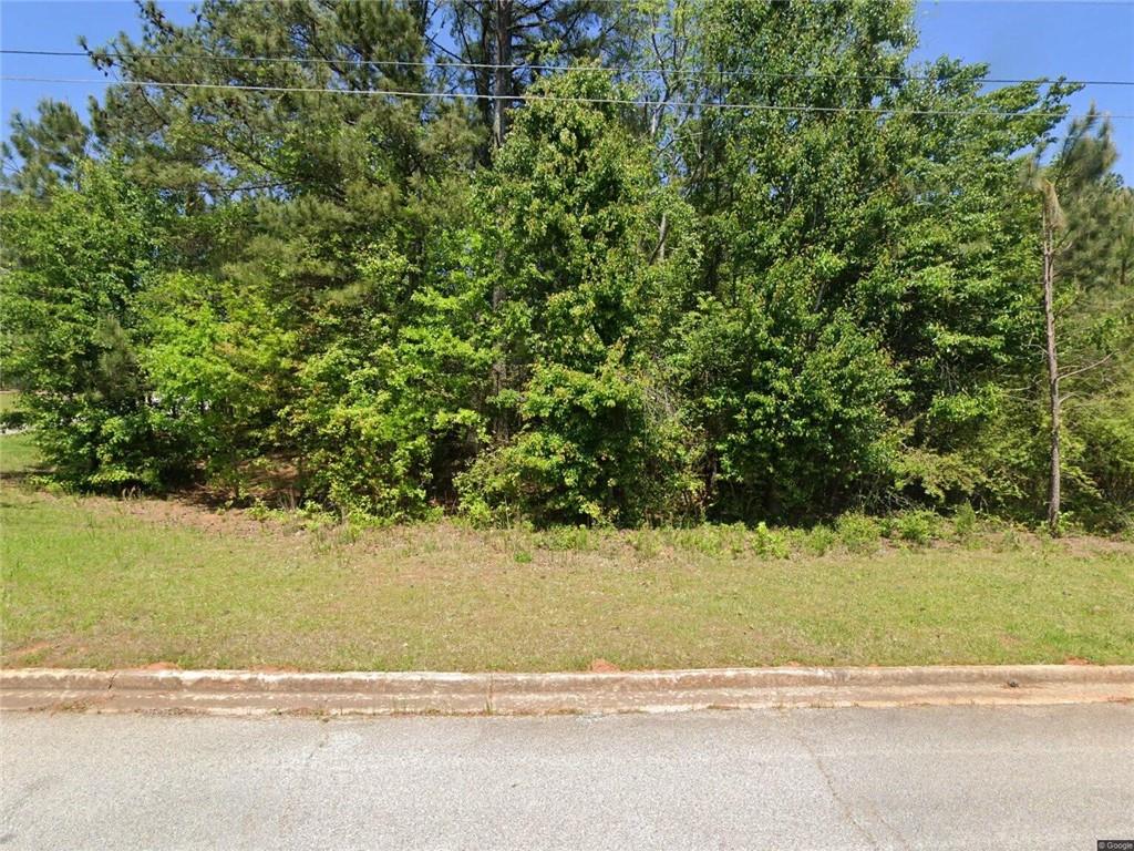 Build your dream home on this beautiful 0.41-acre lot in the desirable St. Andrews Country Club Estates community of Winston, GA. Tucked away on a quiet cul-de-sac, this spacious parcel offers the perfect blend of privacy and convenience, making it ideal for a custom build. Ample space, you have the flexibility to design a home that fits your lifestyle whether you envision a charming single-family home or an elegant estate with outdoor living areas. Located in Douglas County, this neighborhood provides a peaceful, upscale atmosphere while keeping you close to shopping, dining, schools, and easy access to I-20 for commuting. Don't miss the chance to secure one of the few remaining build-ready lots in this sought-after community.