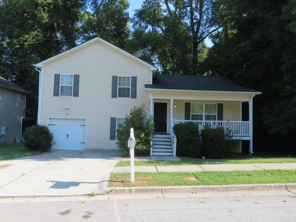 Beautiful home in Bridgeport Park! Covered, rocking chair front porch! Spacious living room with vaulted ceiling! Separate dining room! Kitchen features stained cabinets, stone counters, and stainless steel appliances! Primary bedroom features tray ceiling, walk-in closet, and private bathroom with double vanity! Two spacious secondary bedrooms share another full bathroom! Additional bonus bedroom on basement level! Rear deck overlooks backyard! A must see! Don't miss out!