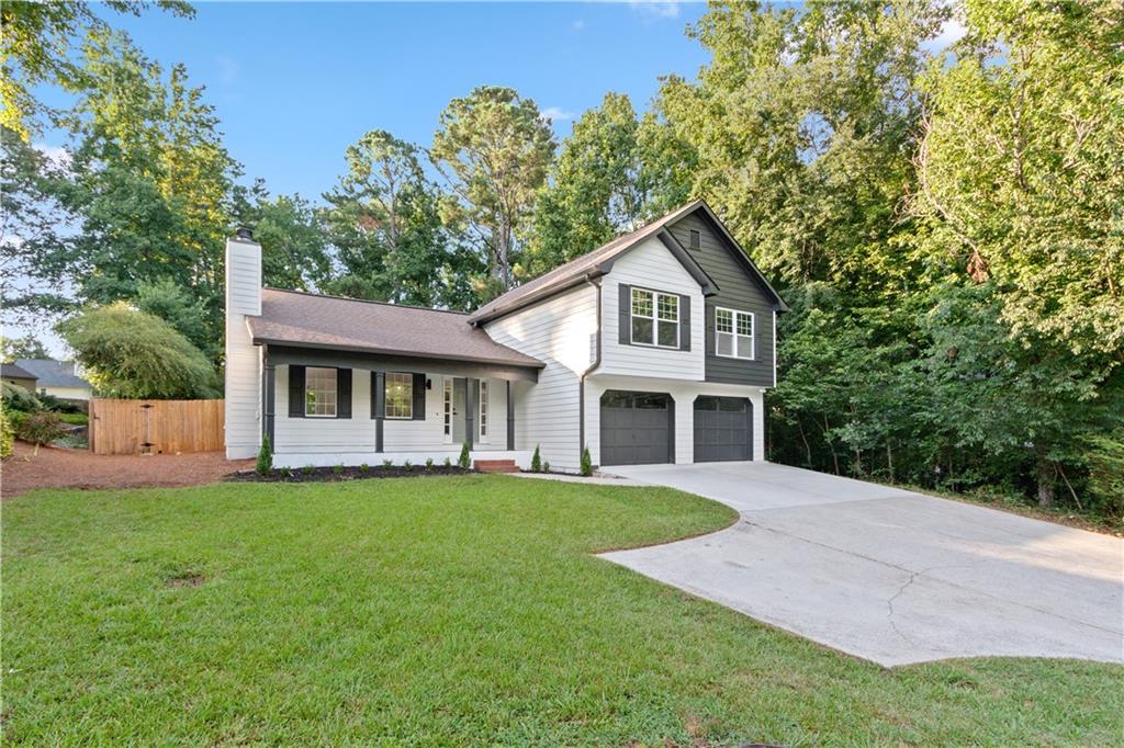 Welcome to this beautifully renovated 4-bedroom, 3-bathroom home in the heart of Buford! This spacious 2,380 sq ft residence features a fully finished basement, ideal for additional living space, entertainment, or a home office. Enjoy the sleek modern upgrades including quartz countertops, brand-new HVAC system, updated electrical, and a new water heater. The home also offers a 2-car garage, ample natural light, and a layout perfect for both everyday living and entertaining. Located in a quiet, well-established neighborhood with easy access to shopping, dining, and major highways. Move-in ready and designed with care, this home is a must-see!