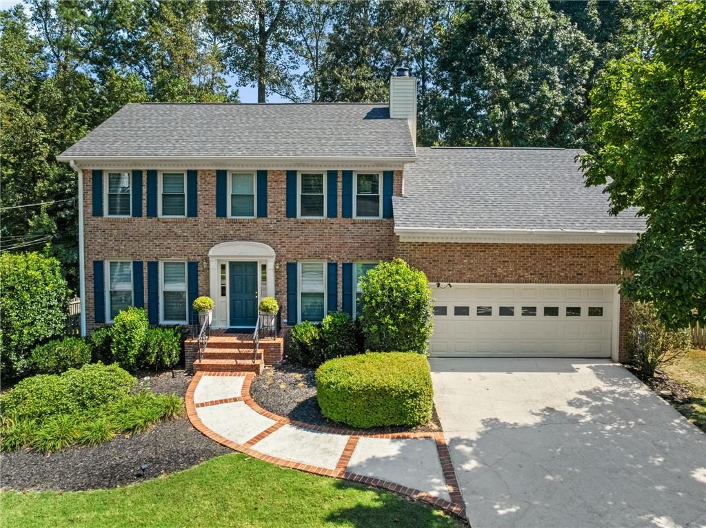 Whether you are looking for convenience or the feeling of vacationing in the mountains, this immaculate, spacious home is the epitome of location, location, location! Don't let the stately façade fool you; the interior has been elegantly updated and cared for. Located in the heavily wooded, serene neighborhood of Flair Forrest and tucked away in a pedestrian-friendly cul-de-sac, you can either be greeted by your active and friendly neighbors or escape to your oversized, private backyard oasis. The terrace level boasts a media room, kitchenette, full bath, gym, large patio, and huge workman's shop, all perfect for those moments when you need time away from the hustle and bustle of life. The main and upper levels of the home speak for themselves, from the oversized family room overlooking the lush green backyard to the tastefully done, sun-draped eat-in kitchen and cozy living room with a real wood-burning fireplace. And don't forget the extra-large bonus room that you can design to your liking. Just off the upstairs staircase, relax in your oversized primary suite or take a stroll to one of the other three bedrooms, one large enough to be a playroom, upstairs media room, or whatever your heart desires. Conveniently located near I-85 N and I-285 and just minutes from downtown Brookhaven, don't hesitate to make this unincorporated, non-HOA dream home your own!