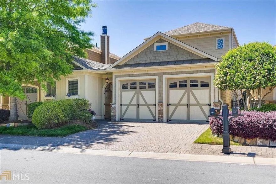 Welcome to a beautifully designed home that blends charm, craftsmanship, and modern comfort in one of Woodstock’s most desirable gated neighborhoods. Thoughtfully planned spaces include indoor and outdoor living areas, a private courtyard, and a detached casita—perfect for guests, a home office, or studio.

Inside, you’ll find 10-foot ceilings with deep crown molding, a coffered great room ceiling, and hardwood floors throughout. The gourmet kitchen is equipped with stainless steel appliances and granite countertops, offering both style and functionality. The primary suite provides a peaceful retreat with a spacious walk-in tile shower and elegant finishes.

Additional features include a tankless water heater, pre-wired speakers, and new carpet in main BR. Located just minutes from downtown Woodstock and I-575, this home offers upscale living with unmatched convenience and quality.