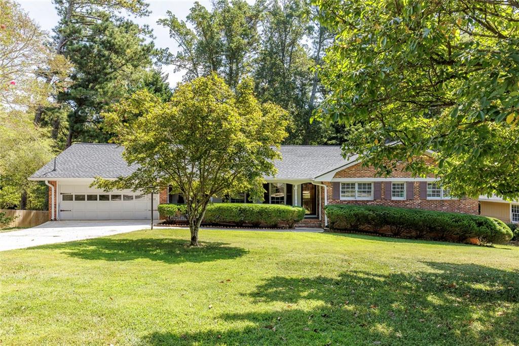 Must see in sought after Lake Erin neighborhood & Livsey ES! Beautiful four-sided brick ranch on a fantastic lot! This well-maintained home features a brand-new 30-year architectural shingle roof, a two-car garage, a level driveway and a charming covered front porch! Rare find with 4 bedrooms on the main along with true one-level living! Hardwood flooring and smooth ceilings throughout with a large living room that opens to the dining room. The updated kitchen features granite tops + a sunny breakfast area. The cozy fireside family room opens to a four-season sunroom with picturesque views of the tree-lined level backyard offering total privacy. The huge full basement—with a fireplace and direct backyard access—offers endless options for finishing. Enjoy the fabulous, private, level backyard in one of the area’s most sought-after communities built around Lake Erin, which is situated within Henderson Park, a popular community park offering amenities such as walking trails, playgrounds, and a community garden!! This is a great find!