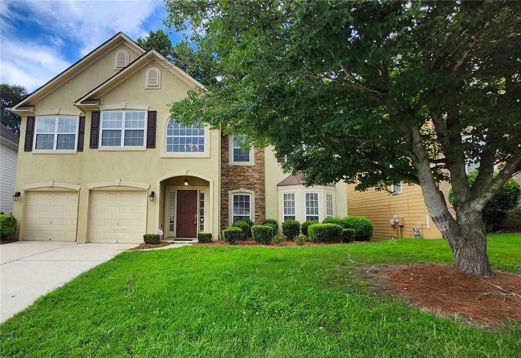 Step into a home that blends expansive living space with functional elegance. This 5-bedroom, 3-bath layout offers flexibility for families, remote work, or multi-generational living — all set within a well-maintained swim and tennis community in Lithia Springs. BRAND NEW CARPET throughout!
The main level features a dramatic two-story foyer, formal living and dining rooms, a dedicated office, and a guest suite with full bath. The open-concept kitchen includes cherry cabinetry, a center island, and a sunlit breakfast nook that overlooks the oversized family room with built-ins and a cozy fireplace. Featuring brand new carpet and fresh paint throughout! Please note that the owner is currently in the process of replacing the downstairs AC unit
Upstairs, you’ll find four additional bedrooms, including a generous primary suite with trey ceiling, dual walk-in closets, and a spa-style bath with jetted tub, dual vanities, and a separate shower. A spacious upstairs laundry room adds convenience where it counts.
Outside, enjoy a private backyard, attached 2-car garage, and quick access to I-20, downtown Atlanta, and Hartsfield-Jackson Airport — ideal for both work and weekend living.