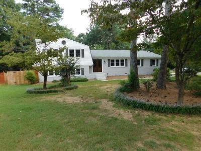 Lovely renovated home. Enter into the main level with open floor plan that consists of a living room, dining area, breakfast area and kitchen. Luxury vinyl planking flooring. Kitchen with white cabinets, recessed lighting, gas stove, microwave, dishwasher, refrigerator (to be provided) & disposal. Stone counters with large island/breakfast bar. Access to the 2-car side entry garage. Off the kitchen there is a sunken sun room with ceiling fan, tile floors, and access to the fenced in backyard with storage shed. There is a sunken family room with gas log fireplace, spare bedroom with ceiling fan, half bath, and utility room that has washer/dryer hook-ups and exterior door. Upper level features three additional spare bedrooms with ceiling fan, full hall bath with tub/shower combination. The master bedroom has a ceiling fan & closet. Enter the master bath through a barn door. There are dual vanities with stone counters, tiled walk-in shower that will be having a shower door installed, and a walk-in closet with a pocket door. Great Cobb Schools! Corner property with lots of yard. Spacious driveway that holds several vehicles. A must see!!