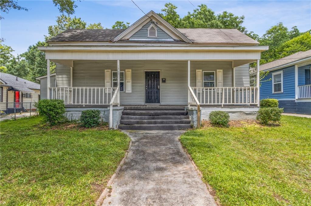 This 3 bedroom, 2.5 bath home is located in Capitol View, one of Atlanta’s fastest-growing Beltline neighborhoods. Inside, you'll find high ceilings throughout most of the home and a layout that’s ready for your updates and personal style. The large backyard offers plenty of space to create outdoor living or entertaining areas, and the classic rocking chair front porch gives a warm welcome at the front. With quick access to major highways, downtown, the airport, and the BeltLine, the location is both central and convenient. Whether you're looking to move in and make updates over time or take on a full renovation, this home offers solid potential in a neighborhood on the rise.