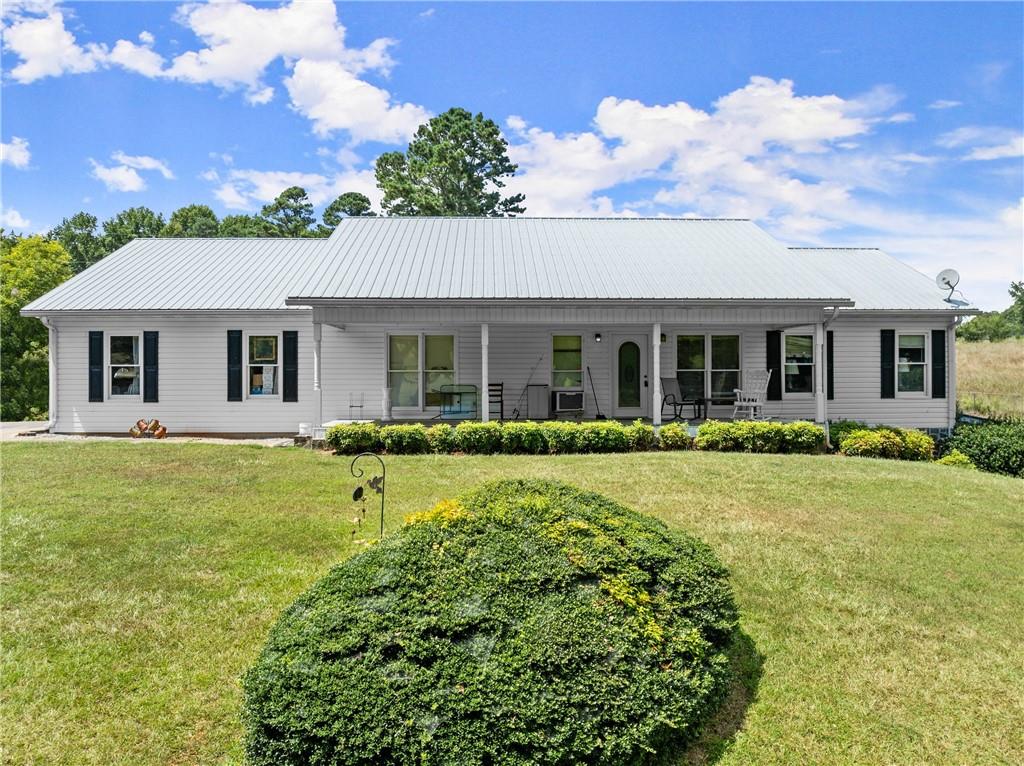 Incredible 35+/- Acre Opportunity in Forsyth County! A one-of-a-kind property offering space, functionality, and potential! This charming ranch-style home features 4 bedrooms and 3 full baths, including a fully finished basement with a second kitchen—perfect for extended living or rental possibilities. The main level offers approximately 1,600 sq ft, with an additional 1,400+/- sq ft in the basement. Enjoy peaceful mornings on the rocking chair front porch, or take in the beauty of two private ponds surrounded by rolling pastureland. The property includes a huge pole barn workshop with approximately 9 bays, ideal for storage, equipment, or hobbies. With over 1,400 feet of road frontage, City Water available, and mostly fenced pasture, this land is well-suited for horses, cattle, or future development. An additional home is located on the property and currently used as a rental, providing extra income potential or a spot for extended family. Conveniently located in growing North Forsyth County, this property offers the rare combination of usable land, privacy, and location. Don’t miss this chance to own a legacy piece of property with endless possibilities!
CUVA land conservation recently activated, with 9 years remaining out of a 10-year term.