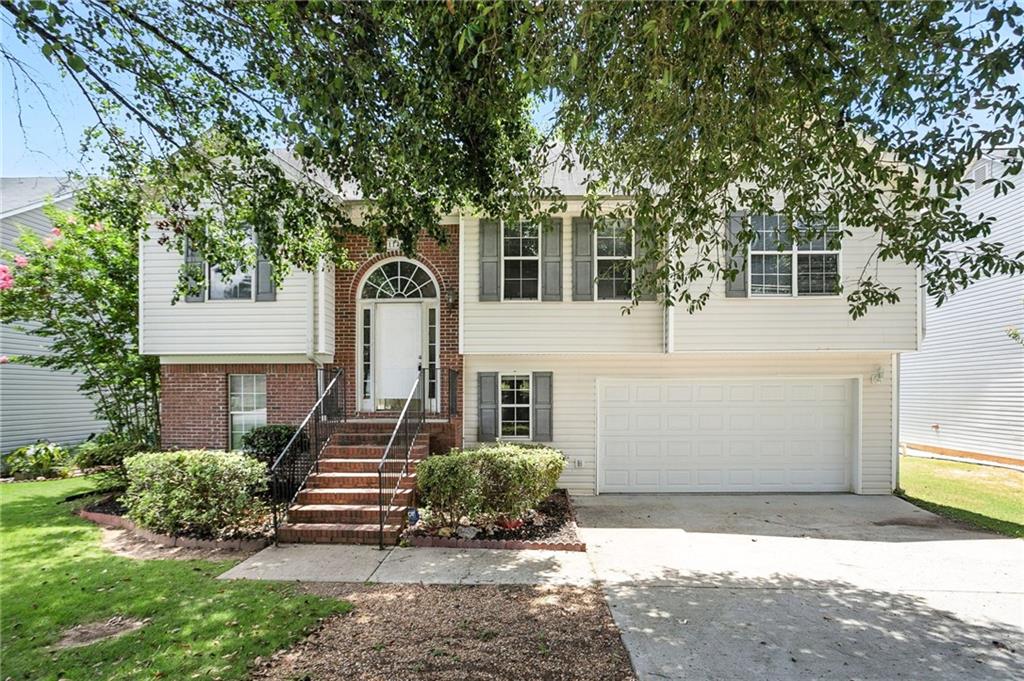 Welcome to this spacious two-story home nestled in the established Spring Lake community. Step inside to find a bright, open floor plan with a large living room ideal for entertaining, a separate dining area, and a versatile kitchen with great cabinet and counter space. The oversized primary suite includes a private en-suite bath and generous closet space. Secondary bedrooms offer flexibility for guests, office space, or hobbies. A two-car garage and extended driveway provide ample parking, while the backyard is perfect for outdoor gatherings or quiet relaxation. Conveniently located near shopping, dining, and major highways.
