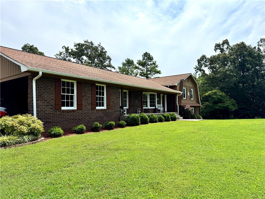 Charming Brick Home on 7.8 Acres with Barn/Workshop!
Discover country living at its best with this well-maintained 3 bedroom, 2 bath brick home nestled on 7.5 picturesque acres. The home features formal
Living and Dining Room, spacious kitchen, large laundry room, with 1/2 bath, Den with gas log fireplace. The home has a finished basement offering a full bath, cozy living area, and two additional rooms—perfect for extra bedrooms, office space, or a hobby area. There is space for a kitchenette to be added. Hot and Cold Waterlines are in place, as well as a 220 volt wiring.
Updates include newer windows and plumbing lines, providing peace of mind and improved energy efficiency.
Outside, you’ll find a versatile barn/workshop equipped with electricity and water, 2 horse stalls and a tack room, ideal for equestrian needs, storage, or a hobbyist’s dream workspace. A separate tractor shed, with water, will always be welcome! The property is dotted with mature trees, offering privacy, space to roam, and stunning views.
Whether you’re starting a hobby farm, need extra space, or simply want serene country living, this property has it all!