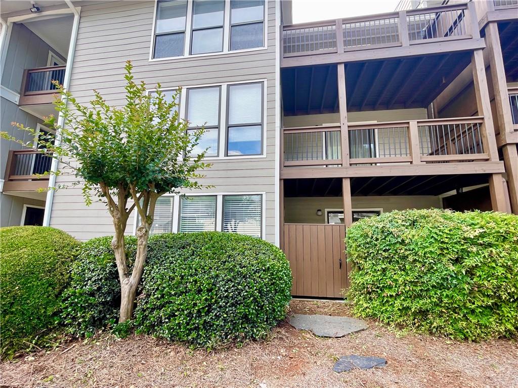 Beautiful fully renovated condo on the main floor & located in top rated school district: Walton, Dickerson (recently rated the #1 middle school in GA) and Sope Creek. Walking distance to grocery stores, restaurants, pharmacies, Chattahoochee Nature Trails, and very close to I-285 & 400. This home futures an oversized bedroom, full bath, walk-in closet, large living room with a gas fireplace, separated dining are open to the living room. A spacious sunroom and covered patio. Perfect spot for relaxing, reading and an office. The community offers a fun pool, tennis courts, and a large grassy area. Move in ready!! The rent includes maintenance grounds, Pest Control, Sewer, Swim, Termite, Tennis, Trash, and Water.