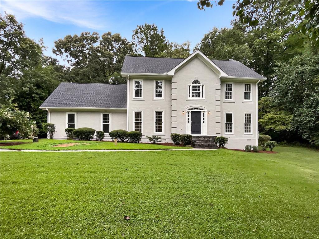 Welcome to this beautifully updated home, boasting a neutral color paint scheme and fresh interior and exterior paint. The living room features a cozy fireplace, The kitchen is a chef's dream with all new stainless steel appliances.The primary bathroom is a haven of relaxation with double sinks, a separate tub, and shower. New flooring extends throughout the home, and a new HVAC system ensures year-round comfort.The exterior boasts a new roof and a spacious deck perfect for outdoor entertaining. This home is a must-see, offering modern conveniences and stylish finishes. 100-Day Home Warranty coverage available at closing