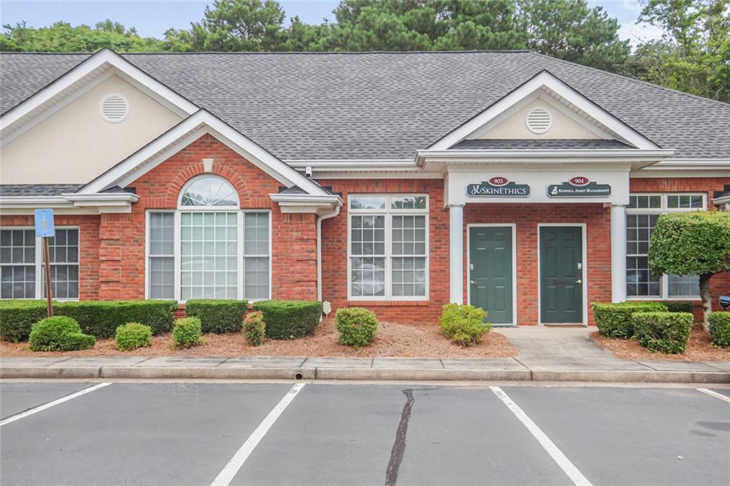 Beautifully Updated Unit in beautifully kept Office Park, which offers access from both Crossville (Hwy 92) and Crabapple Roads. The front Reception adjoins a light-filled Conference Room/Display Area/Admin Office with upgraded barn door. The connecting hallway leads to 3 other spacious offices, a wet bar/kitchenette and private restroom, and a small storage/file/workroom. New Wood Laminate Flooring throughout with fresh Neutral Gray Walls. New Counters and Bathroom Vanity updated in past 2 years. Located close to central mailbox hut. This 25 building office park features nearly 125,000sf of individually owned office condos and offers attractive retail in front of the park, including a wine bar, BBQ restaurant, pharmacy, auto maintenance shop, QuikTrip and much more! Office Park is located close to Historic Roswell offering many lunchtime dining and client entertaining options. Property is also for Sale.