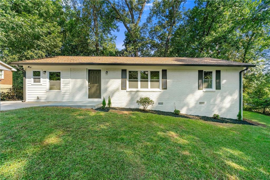 Move-in ready 3BR/2BA home for sale in Mableton, Cobb County! This turn-key property offers ~1,450 sq ft with a custom kitchen featuring quartz countertops, new luxury vinyl plank flooring, updated bathrooms with designer tile, and all new windows, plumbing, and modern fixtures. Relax on the new back deck, enjoy the quiet backyard, and take advantage of the large side yard for entertaining or play. Conveniently located near Cobb County schools, walk to shopping & dining, and easy drive major highways. This home delivers comfort, style, and value!