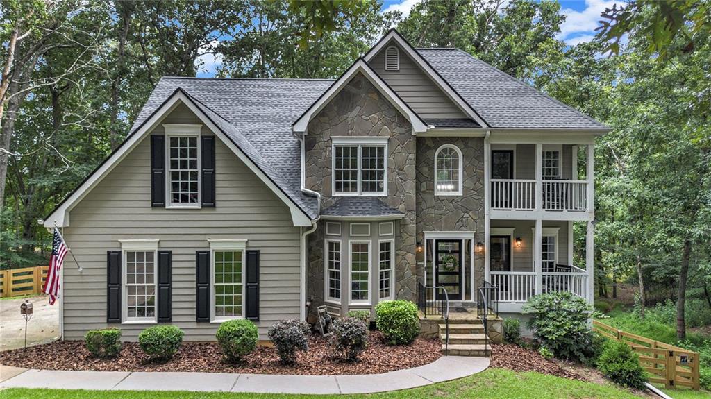Welcome to Lake living at it's finest! This home has it all - the perfect blend of privacy and accessibility! Situated on over an acre with a single slip dock located minutes from multiple lakefront restaurants and marinas! You'll love the versatility of this home, once you walk into the front door! Starting with the open floor plan, and gourmet kitchen with large eat-in area overlooking the great room with a wall of windows that provides a lot of natural daylight, and amazing views of the lake. Never leave the lake and work from home - with 2 home offices/studies! Step out onto one of the multiple decks or the screened porch with a fireplace and television for movie night under the stars! All the amenities of a lake resort including a hot tub and fire pit!
The recently renovated terrace level is an amazing apartment with a bedroom, full bath, living room, full kitchen, and laundry room! Multiple private entrances make it perfect for teens, in-laws, or a potential rental income source! All this and so much more including a new roof - just 1 year old!
Bring all your outdoor and water toys - No HOA or rental restrictions!!