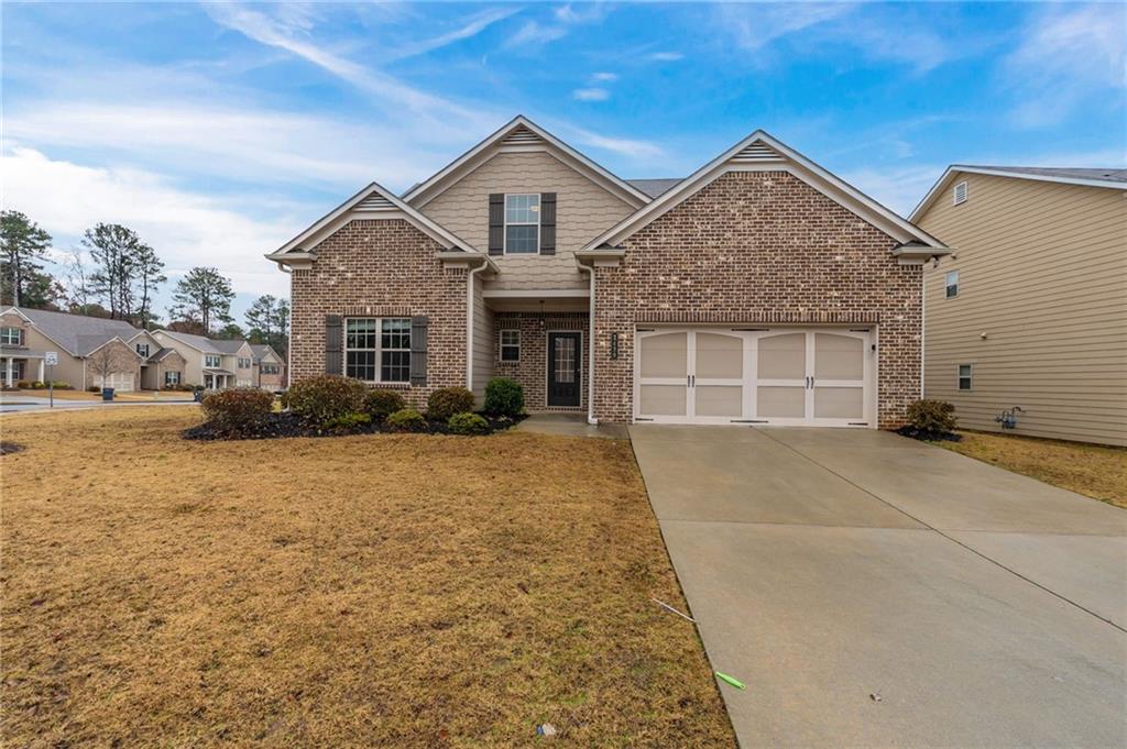 Stunning move-in ready home nestled in a charming Dacula neighborhood. This beautifully maintained property features an open floor plan with spacious living areas, perfect for entertaining or relaxing. The well-appointed kitchen boasts modern appliances, ample countertop space, and a cozy breakfast nook. Enjoy the spacious primary suite with a luxurious en-suite bathroom and generous closet space. The backyard offers an open oasis with a covered patio and landscaped yard, ideal for outdoor gatherings. Conveniently located near schools, parks, and shopping, this home is perfect for anyone looking for a peaceful community. Don't miss the opportunity to make this lovely residence your own!