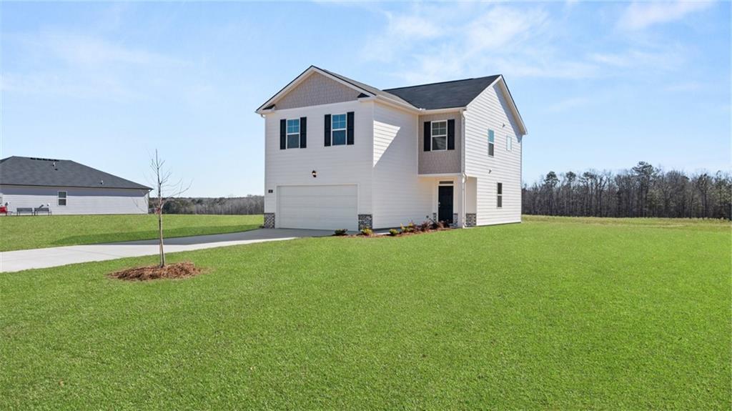 Spacious homesites, exceeding one acre in size, are available in a prime location. Fox Crossing provides easy access to I-75, a variety of restaurants, and shopping options. Experience suburban living while enjoying the conveniences of urban life. Additionally, downtown Atlanta is just an hour away, allowing you to explore world-class entertainment, renowned sporting events, and concerts. For those who love the outdoors, High Falls State Park and Indian Springs are only a short drive from your doorstep. Introducing the Aisle Plan by D.R. Horton--a refined two-story residence featuring 4 bedrooms, 2 bathrooms, and 1,929 square feet of meticulously designed living space. The open-concept design seamlessly integrates a gourmet kitchen equipped with granite countertops, stainless steel appliances, a spacious island, and a walk-in pantry with a generous living and dining area ideal for hosting gatherings. On the upper level, the primary suite offers a private sanctuary complete with dual vanities, a large walk-in closet, and a stylish bathroom, while three additional bedrooms and a full bath provide ample space for family and guests. Notable features include energy-efficient windows, smart home technology, and a two-car garage. THIS HOME IS TO BE BUILT, with an expected completion date in May 2025. Take the opportunity to be among the first to choose your lot and start building your new home today! Appointments are available now!
