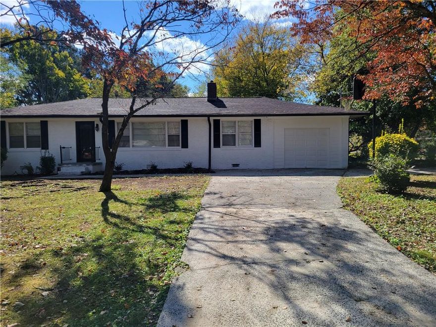TOTALLY RENOVATED & MOVE-IN READY!!! Welcome home to this beautifully updated ranch-style gem in the heart of Marietta! This home has been completely renovated from top to bottom—freshly painted inside and out, featuring brand-new appliances, ceramic tile bathrooms, and luxury vinyl plank flooring in the kitchen and one bedroom, complemented by gorgeous hardwood floors throughout. The modern kitchen offers granite countertops, and white cabinets. Located in a quiet, established neighborhood, this home offers easy access to I-575, I-75, shopping centers, restaurants, and Kennesaw State University. Don’t miss this opportunity—this stunning, move-in-ready home won’t last long!