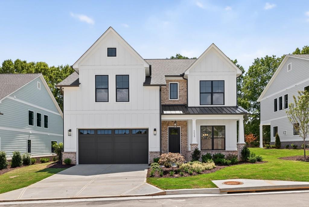 The Sadie Plan built by Heatherland Homes. Quick Move-In! This is where luxury living meets modern convenience in one of Northwest Cobb's newest premier communities. From the moment you walk through the door, you'll be welcomed by high end finishes and on trend design that feels both stylish and timeless. Soaring ceilings, a vaulted living room, coffered ceilings in the dining room, hardwood floors throughout the main living areas, and detailed designer trim work set the stage for a truly elevated lifestyle. Beautiful quartz countertops are showcased throughout the home, adding a touch of elegance to every space. The main-level primary suite is a true retreat, featuring a spa-inspired frameless shower, and soaking tub, and an oversized walk-in closet. Love to cook? The gourmet kitchen is a showstopper, with modern appliances, sleek double ovens, and a statement making oversized island that's perfect for everyday meals and unforgettable gatherings. The community also features a dog park, sure to be a favorite for your four-legged family members. Limited time offer with Special inventory pricing! As about our $20,000 Any Way You Want It* incentive with the use of the preferred lender with binding contract by 09/30/2025. Incentive is homesite specific. **All photos are stock photos from the builder**
