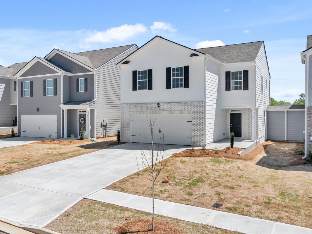 73 Rolling Meadow Trace is one of our new construction homes available at Rolling Meadows in the revered Jasper, GA. This Aisle plan has a lot to offer in its 1,927 square feet of 4 bedrooms and 2.5 bathrooms with a two-car garage. Stepping into the home from the front porch, you are immediately greeted by an open foyer with a powder room. The main living space provides an open concept where family and friends can gather. The kitchen is a chef's dream with granite countertops and stainless steel appliances including a self-cleaning electric range with glass cooktop. The large island provides a perfect view into the dining area with access to the back yard. 4 bedrooms and 2 full bathrooms are located on the second floor including the luxurious primary suite. Homeowners can relax and feel rejuvenated with all that the primary bathroom offers including dual vanity with granite countertops, separate soaking tub and walk-in shower plus a large walk-in closet. The additional second floor bathroom provides plenty of space with the granite countertops dual vanity. Convenient upstairs laundry. Don't miss this opportunity to enjoy the gorgeous Blue Ridge Mountain views and great amenities offered at this Jasper, GA community. Come out to Rolling Meadows today to grab this Aisle plan and discover your new home at 73 Rolling Meadow Trace.