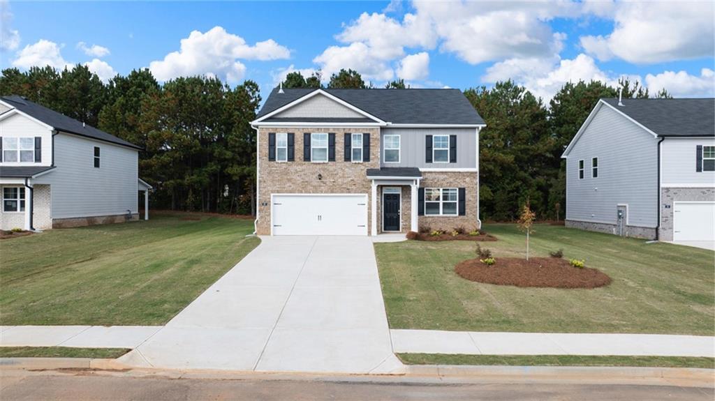 TENNIS COMMUNITY, MINUTES FROM I-75, DINING & SHOPPING AT TANGER OUTLETS, UNBEATABLE VALUE! SPECIAL FINANCING AVAILABLE. INTRODUCING THE HANOVER FLOOR PLAN! Open the door to a flex room that could be a dedicated home office or formal dining. Island kitchen with oversized pantry flows into casual breakfast area and into the spacious family room. Cabinet color options include gray and white. Upstairs includes a large bedroom suite with expansive spa-like bath and generous closet. Three secondary bedrooms and laundry complete this classic traditional home. And you will never be too far from home with Home Is Connected.? Your new home is built with an industry leading suite of smart home products that keep you connected with the people and place you value most. Irrigation system also included. Photos used for illustrative purposes and do not depict actual home.