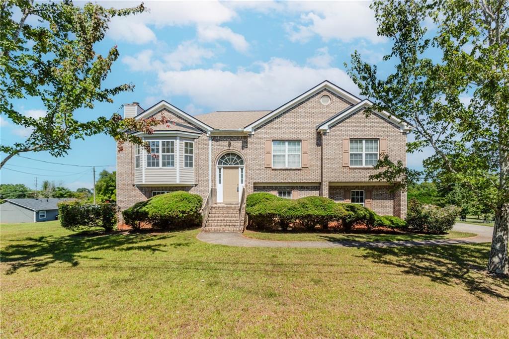MOVE-IN READY, 3 SIDES BRICK HOME *ONE OWNER FOR 25 YEARS *HOME IS FILLED WITH RECENT UPDATES *FRESH PAINT THROUGHOUT *NEW HIGH-END LVP FLOORING THROUGHOUT *NEW STAINLESS STEEL APPLIANCES *FIRESIDE GREAT ROOM WITH VAULTED CEILING *FORMAL DINING ROOM *EAT IN KITCHEN WITH AN ABUNDANCE OF CABINET AND COUNTER SPACE, PANTRY AND BREAKFAST AREA *OVERSIZED PRIMARY SUITE WITH TRAY CEILING AND 2 WALK-IN CLOSETS *PRIMARY ENSUITE WITH DOUBLE SINK VANITY, SOAKING TUB AND SEPARATE SHOWER, UPDATED FAUCETS *2 GENEROUSLY SIZED SECONDARY BEDROOMS ON MAIN *2 LINEN CLOSETS *FINISHED LOWER LEVEL WITH 4TH BEDROOM, FULL BATHROOM AND MEDIA / FAMILY ROOM *COVERED BACK DECK OVERLOOKS HUGE, LEVEL BACKYARD AND LARGE SIDE YARD *2 EXTRA DEEP GARAGES WITH STORAGE SPACE *NO HOA