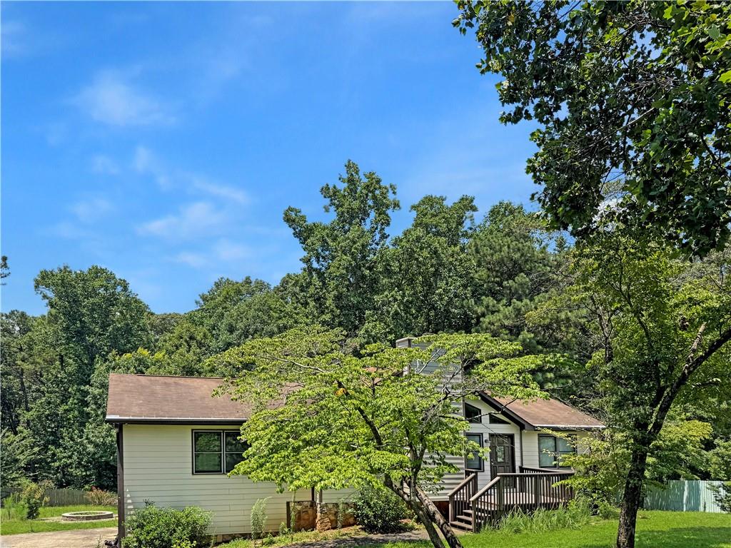 Welcome to this stunning 4-bedroom, 3-bathroom home in the desirable ValleyBrook neighborhood of Woodstock. This property offers incredible versatility and luxury, including a fully equipped efficiency/studio apartment in the basement with its own bedroom and bathroom—perfect for guests, extended family, or a private workspace.
The oversized master suite features a spa-like en suite with a jetted tub, separate shower, and ample closet space. The gorgeous kitchen is designed for cooking and entertaining with tons of storage, a large pantry, and a built-in wine fridge. The elegant dining room boasts beautiful French doors that open directly to the covered back deck, creating an ideal space for indoor/outdoor living.
The private, fenced backyard includes a firepit for cozy evenings. A rare tandem 3-car garage located on the basement level offers plenty of room for vehicles, storage, or a workshop. For added convenience, there are washer and dryer hookups on both the main level and in the basement. The home also features a tankless water heater for endless hot water.
The basement studio apartment, located off the garage, offers a private entrance, full bathroom, and living space, providing flexibility for a variety of uses.
Applicants must have a minimum 650 credit score and a combined household income of at least three times the monthly rent. No prior evictions will be considered.
