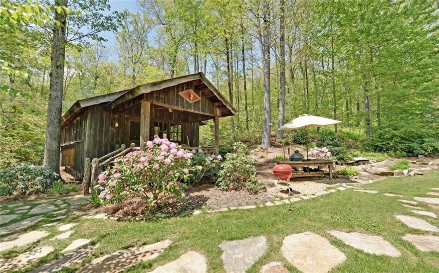 Wintermont - 248 ac in the North GA mountains the property features a cove forest w/walking trails,  110ft waterfall, beautifully landscaped trout pond, numerous creeks and additional waterfalls, gated and paved roads, underground utilities, the eastern boundary is the Dawson Forest Wildlife area, a 20,000+ ac preserve.  The property features a BARN that has been turned into a delightful 1bdrm/2 bth residence w/ full kitchen ss appliances and a darling COTTAGE finished in antique barn wood, fully equipped kitchen with bdrm and bath sleeps 5 w/  &  outdoor stone fire pit