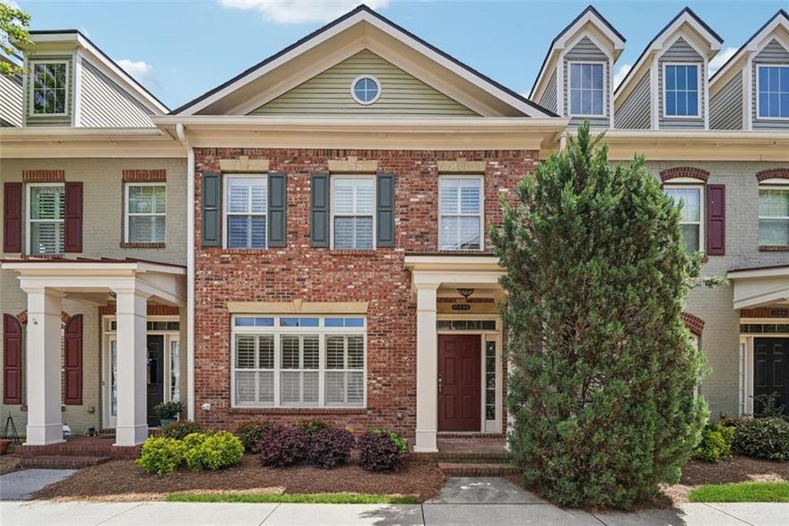 Welcome to this freshly painted 2-bedroom townhome in the family-friendly, gated Abberley Township, located in a top-rated Johns Creek school district near Avalon and Morton Road Park. This home offers the largest 2-bedroom floor plan in the subdivision, featuring an open layout with high ceilings, hardwood floors, and abundant natural light. The modern kitchen includes stainless steel appliances, flowing into a large family room with custom built-ins. The master suite boasts a fireplace, huge bathroom, and walk-in closet, while the second bedroom has its own full bath. Enjoy new floors, a private courtyard, and a rear-entry 2-car garage with storage. Perfect for families or professionals, this home is close to parks, shopping, dining, and major roadways.