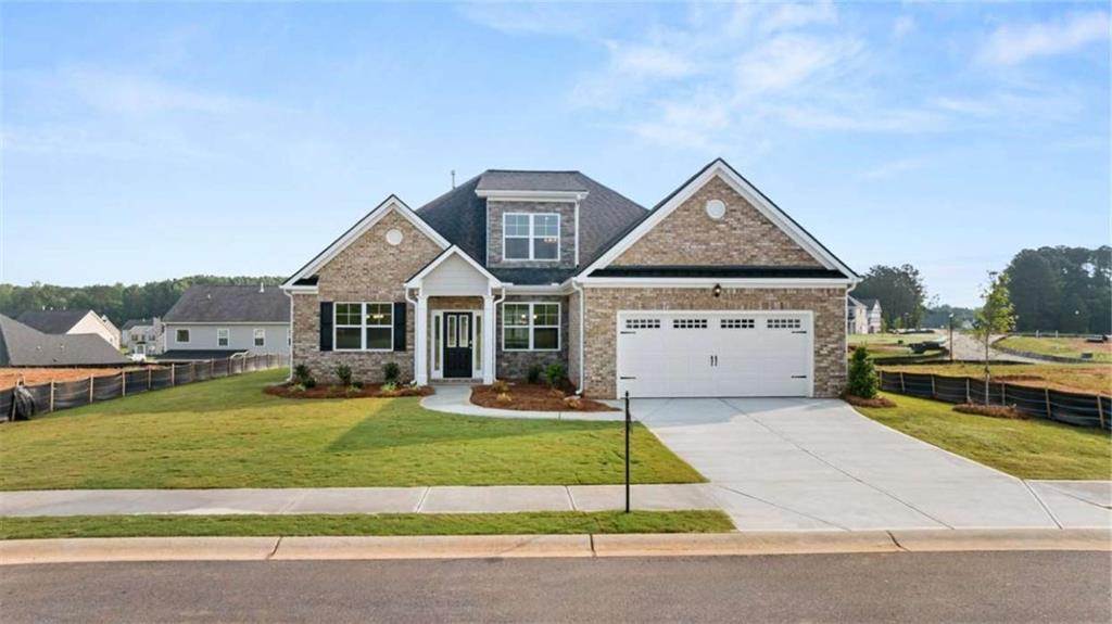 GOLF CART PATH TO HISTORIC DOWNTOWN SENOIA MINUTES TO PEACHTREE CITY WITHOUT THE PRICE TAG OVERSIZED LOTS WITH WOODED PRIVACY The Marlene is a beautiful ranch plan with 4 bedrooms and 3 baths, plus a bonus room upstairs with a full bath. The main level showcases an open-concept design with an oversized island, quartz countertops, stainless steel appliances, and stylish cabinetry flowing seamlessly into the dining and living areas. The owner's suite features an oversized walk-in closet with direct access to the tiled laundry room, along with a spa-style bath including double vanities, soaking tub, and separate shower. Two secondary bedrooms share a well-appointed bath, and a convenient fourth bedroom with access to a full bath offers added flexibility. Upstairs, the bonus room with full bath provides the perfect space for guests, a media room, or private retreat. Covered porch overlooks wooded backyard. Resort-style amenities include a sparkling aquatic center with cabana seating, tennis and basketball courts, playground, and clubhouse for gatherings. Smart home technology included. Photos are for illustrative purposes only and may not reflect actual home finishes.