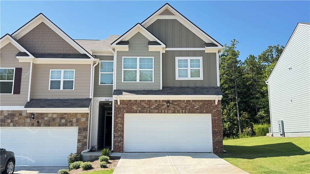 $2300 ~ End Unit 4 Bedroom 2.5 Bathroom in the Mountain Park community in Dahlonega, GA. This location is great for Students and for local Medical Professionals with its convenient proximity to UNG Campus and Northeast Georgia Medical Center. As you enter the home, you have a long foyer that leads into the main living area. A large family room, with a sleek electric fireplace mounted on the wall, is the perfect place for family and friends to gather or for a quiet night with a book or movie. The family room flows seamlessly into the well-appointed kitchen with a center island, granite countertops, subway tile backsplash, shaker-style cabinetry, and stainless-steel appliances. A dining area directly off the kitchen provides space for a dining table and opens onto the back deck or patio. There is also a half bathroom tucked away on the first floor. Up the stairs, you'll turn from the landing into the primary suite. A spacious bedroom is complemented by the en suite bathroom featuring a separate tub and shower, dual vanity, water closet, linen closet, and a roomy walk-in closet. Across the landing, you'll be led into a hallway leading to the additional bedrooms. 3 secondary bedrooms, the laundry room, and an additional bathroom, also with a dual vanity, round out the upper floor. Mountain Park features a community clubhouse with a fitness center and a gorgeous pool with cabana seating. A location just off of South Chestatee Street brings all that Dahlonega has to offer right to your doorstep. Dahlonega is known as the Heart of Georgia Wine Country. There are a plethora of wineries in Dahlonega and the surrounding areas to visit, and the Blue Ridge Mountains offer up hikes, waterfalls, and plenty of other outdoor activities. This home is managed by the owner, so no extra junk fees are added, as is the case with most rentals. Rental criteria: Excellent rental history, Verifiable income of 3 times the rent, must be verified with pay stubs, W-2s, and/or bank statements. Credit, Criminal, and Background checks will be run. Pets are accepted on a case-by-case basis and with a non-refundable pet fee. No extra pet rent, just the non-refundable pet fee.