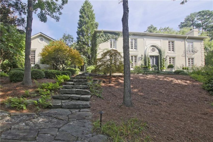 This property located on a cul de sac is a dream at 1.24 Acres and 5 minutes from Buckhead. Jackson school district and close to private schools. It feels like the South of France. See my video on Zillow. All of the main level walks out to the private pool & flat grounds. Room for a tennis court. Inside, the residence has high ceilings, tons of character, natural light. Hardwoods throughout and limestone in the foyer. The master overlooks the pool and would be a perfect spot for french doors and a patio.