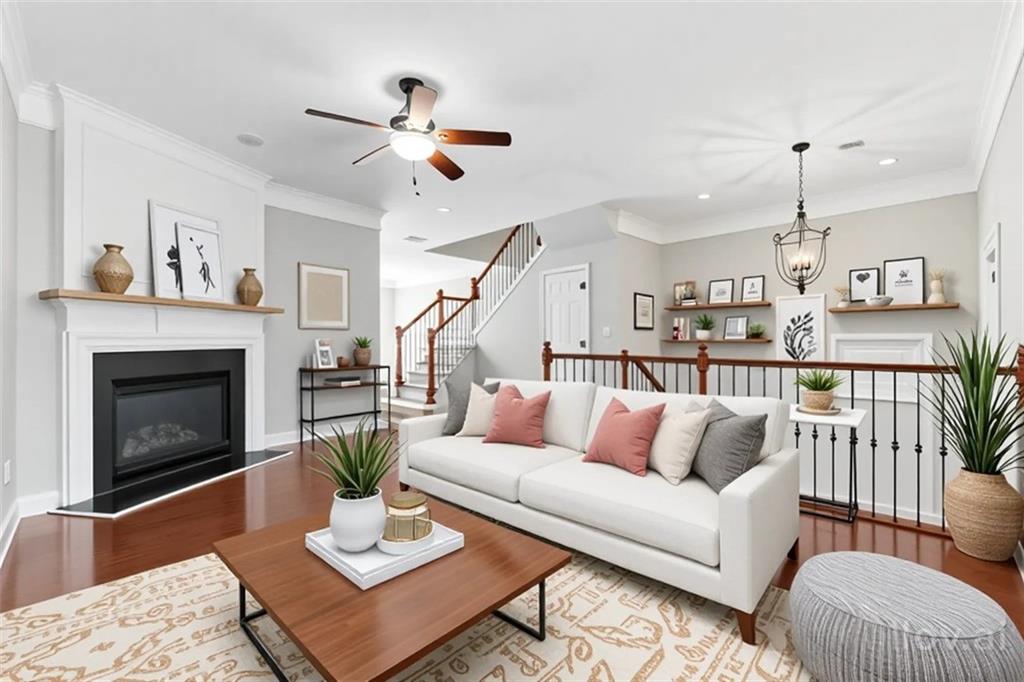 Beautiful Friendly Neibourhood! Turnkey modern smart home tech with fully upgraded hardwood flooring and paint surrounded by a meticulously landscaped front yard and warm scenic views of the tree-lined street and lush yards where suburban tranquility meets urban convenience to enjoy the unparalleled Smyrna lifestyle. A sun-drenched living room featuring gleaming hardwood floors and a cozy fireplace, a chef-inspired kitchen beautifully updated with granite countertops, stainless steel appliances, and ample cabinetry with additional space for dining and a walk-in pantry. Upstairs, 2 spacious bedrooms include a primary suite with a spa-like bath with heated floors and a custom closet system. A new deck or swim in the pool! Convenient guest parking right outside your door with 2-car garage. Minutes from the Silver Comet Trail, I-285 access, and Smyrna Market Village are <0.5 miles
