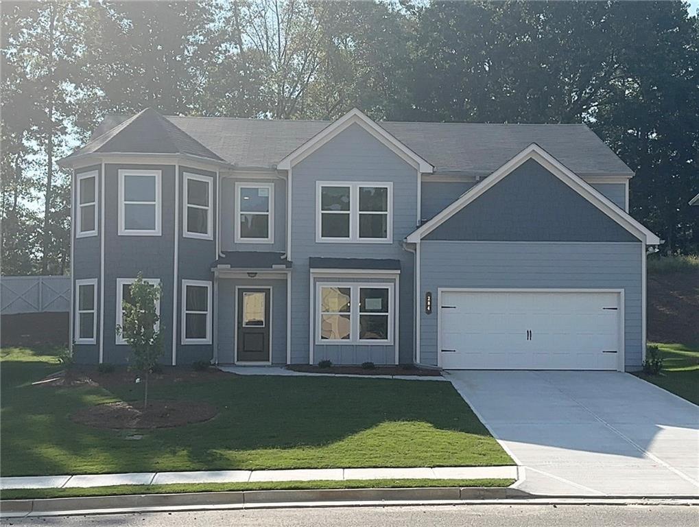 Enjoy the high-demand finishes of this open-concept layout, including stainless steel appliances, granite counters, durable LVP, tile backsplash, fireplace, upstairs Media Room, main level Bedroom with full Bath, and so much more! The Master Suite features a large walk-in closet and 4-piece ensuite with double sink vanity, shower and enclosed water closet. Braselton's best kept secret, a very quiet community just minutes to it all! With the mature trees, an abundance of green space and a beautiful, stocked lake, one would never know they are just 1.5 miles from I-85. Fox Creek residents can access I-85 either at Exit 126 or Exit 129 (either way, it is only 1.5 miles). Fun restaurants, shopping and Town Green can be found less than 2 miles away either in the historic town of Braselton or the historic town of Hoschton. Northeast Georgia Hospital is 2 miles away, Chateau Elan is one mile away, Lake Lanier just minutes away...the location of Fox Creek truly cannot be beat! Future amenities will include clubhouse, pool, playground, fishing dock and walking trails. Don't miss the opportunity to experience the ease of living in this brand-new New Home community.