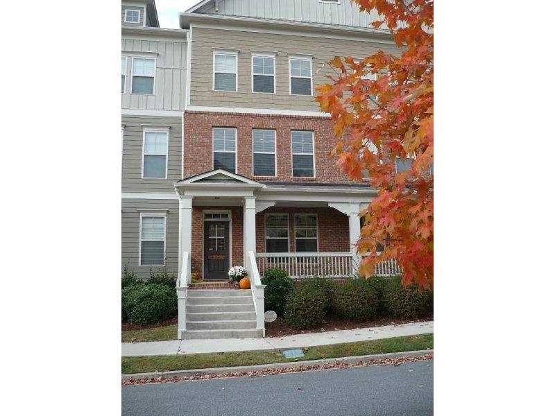 This beautifully updated townhome in Suwanee’s sought-after Village Grove community offers a spacious split-level layout with new hardwoods, travertine bathroom floors, and a large master suite with walk-in closet. The kitchen features granite countertops opening to a cozy living area with a fireplace and private deck. Enjoy the convenience of a 2-car garage, private patio, and access to swim and tennis amenities. Just minutes from Suwanee Town Center, you’ll be near top-rated schools, parks, and vibrant community events. Known for its charm, trails, and family-friendly vibe, Suwanee has been ranked one of Georgia’s best places to live. Move-in ready and full of style, this home won’t last long—schedule a tour today!
