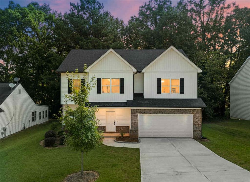 Like-New Home Built in 2023! - Prime location just minutes from I-85, Sugarloaf Mills Mall, and major shopping/dining. This 4BR/3.5BA beauty offers a modern open floor plan with LVP flooring throughout the main areas and carpet only in the bedrooms.
Main level features a flex room that can easily convert into a 5th bedroom, a spacious kitchen flowing seamlessly into the living room, and a convenient half bath. Upstairs, you’ll find a loft area, a Jack & Jill bath connecting 2 bedrooms, and an oversized master suite with plenty of space to relax.
Enjoy privacy with the fenced backyard—perfect for family gatherings or pets. With its central location and like-new condition, this home is move-in ready and won’t last long!
