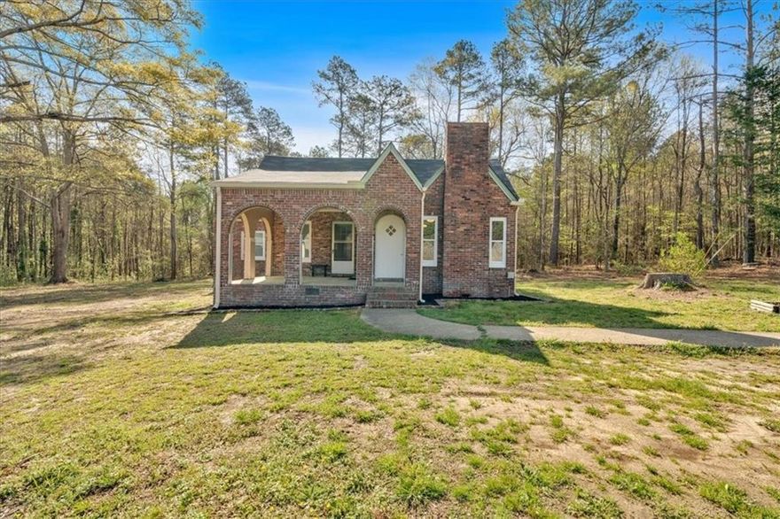 Wonderful opportunity in Rockmart.  Charming 1900's Bungalow situated on a private 1-acre lot.  New Roof, windows, flooring and many other updates!   Home has a recent renovation but still places to give some TLC and make it your own.  2/2 with several flex rooms and loaded with charm and character.   Perfect Investment or live in and grow!  Located off Hwy 278 between growing Rockmart and Cedartown.   Schedule your showing today!