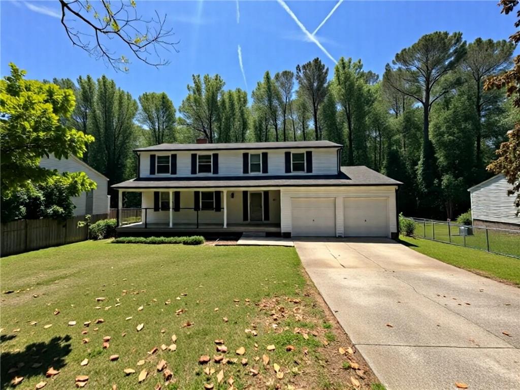 New architectural roof just installed and recently painted! New HVAC system. Welcome to your wonderful 2 story traditional home with 5 full bedrooms and 2.5 baths. Beautiful neutral thick Laminate and LVP floors throughout. Featuring a formal living room with a fireplace, dining room, kitchen, breakfast area, 2-car attached garage, and a deck overlooking a private backyard. Also comes with a bonus room and a full unfinished basement for extra storage and your future in-law, mancave, additional income or expansion. Sit back and relax on your big covered front porch. Comes with a 1 year home warranty. Close to I-75 & 675, restaurants, and shopping.