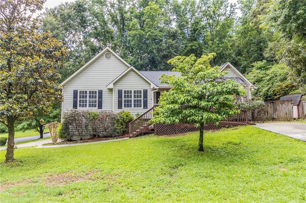 This beautifully updated 3-bedroom, 2.5-bath home features new windows, fresh interior paint, new light fixtures, and vaulted ceilings. The kitchen boasts painted cabinets, quartz counters, and a stainless steel appliance package including range, microwave, and dishwasher. Enjoy new LVP flooring, carpet, and a half bath in the basement/garage level, making this home stylish, functional, and move-in ready.