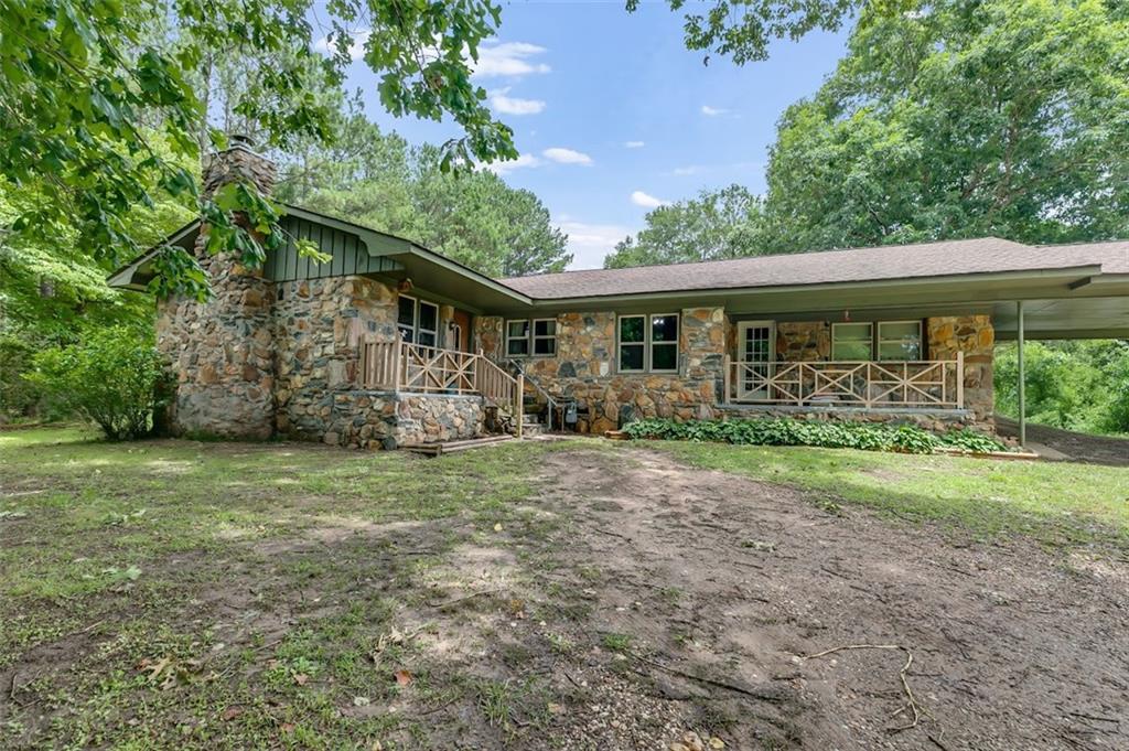 This 3-bedroom 2-bathroom stone home sits on just under an acre. The home has a very spacious living room with a wood-burning
chimney. The AC unit and new ductwork were installed 2 years ago. Workshop out back with power. Conveniently located near GA HWY
120, US HWY 27, and minutes away from I-20, making your commute a breeze. This home is located in a USDA financing area, which
means 100% financing is available to those who qualify.