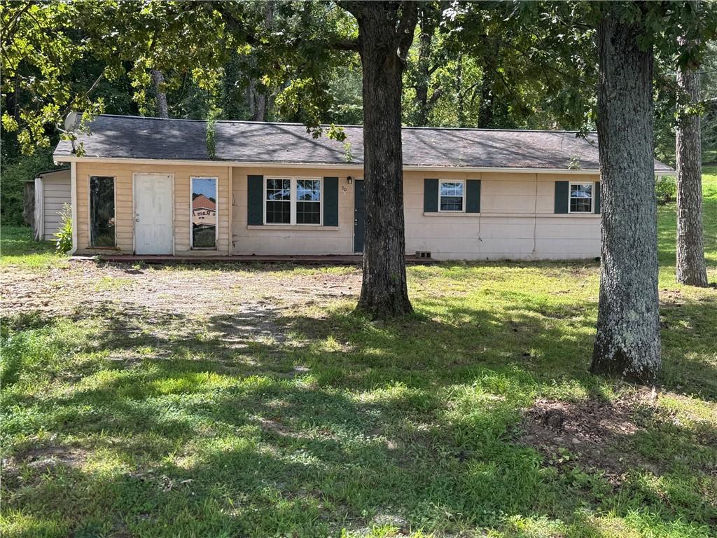 This classic block home offers incredible potential for the right buyer. Sitting on a generous .7 acre lot, the property provides one-level living with a solid foundation and great bones.While the home is in need of a complete renovation, many of the big ticket items are already in place. Including a newer HVAC system, a good roof ,and energy efficient thermal pane windows.m The layout and construction make it an ideal candidate for a full remodel whether your looking to renovate and resell. Create a rental property. This spacious lot allows room for outdoor living ,gardens, or expansion. A super location close to Lake Allatoona, I75,downtown Cartersville. Looking for cash buyers. Call Peter for access and additional details.