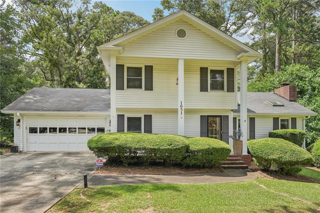 Stylishly Updated Corner-Lot Home in Riverdale | 3 Bedrooms + Flex Room | Fenced Patio | Move-In Ready! Welcome to 1651 King Rd, Riverdale, GA 30296! This beautifully updated 3 bedroom, 2.5 bath home is situated on a desirable corner lot with versatile space and modern finishes throughout. This move-in ready gem offers the perfect blend of comfort, functionality, and style, ideal for both first-time buyers and growing families. Step inside to discover updated flooring, modern light fixtures, and a neutral color palette that flows effortlessly throughout the home. The main floor features a flex room with a closet, perfect for a home office, guest bedroom, or playroom, along with a convenient half bath and a spacious laundry room for added functionality. The heart of the home is the modern kitchen, where you’ll find charming butcher block countertops, updated cabinetry, and space for both cooking and gathering. Upstairs, the primary suite offers a generous walk-in closet and an updated en suite bathroom for a peaceful retreat. Two additional bedrooms and another full bath complete the upper level. Outside, enjoy a fenced-in patio area, perfect for entertaining, relaxing, or letting pets play safely. As a corner lot, this home offers extra privacy and curb appeal with mature landscaping and plenty of natural light. Come check it out for yourself today!