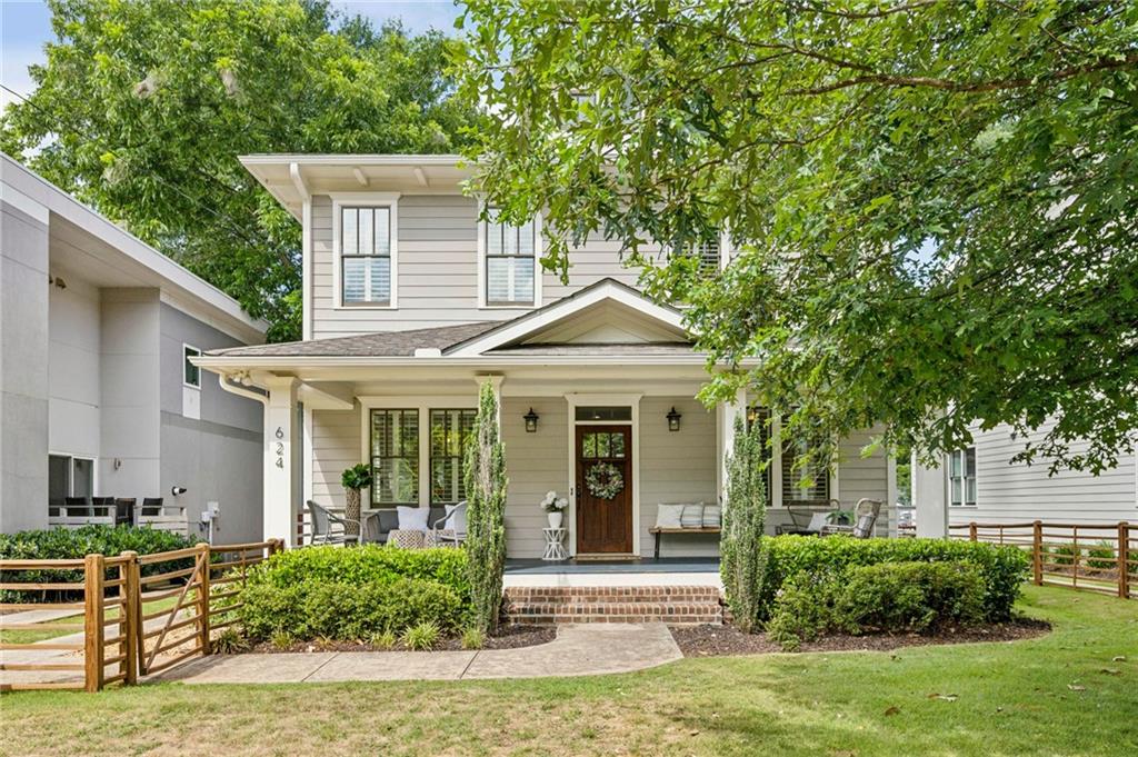 On the market just in time to kick off the 2025 City of Decatur school year! Grab this 2014 build featuring 4 bedrooms/3 baths in the main house and a coveted 1 bedroom/1 bath carriage house apartment over the garage. The separate guest unit has been a successful AirBNB / VRBO, in-law suite and a home office. Situated on a perfectly level lot, summer BBQ's will find you bouncing from inside to outside enjoying the screened rear porch, fenced back yard (complete with playset and trampoline) and saying hello to neighbors from the huge front porch with fenced front yard. Inside, the main level hardwoods are beautifully re-finished, the walls are newly painted and the huge owner's closets are just waiting for you to move in. The owner's suite layout provides a truly generous space for two master closets, a wall of windows peering out to the backyard and a grand owner's bath. At the top of the stairs is a flex space with built-in shelves, perfect for an art room, music room or secondary living room. Life on the main level provides an open concept layout, with a butlers pantry pass-through to the dining room, two kitchen pantries and beautiful built-ins surrounding the fireplace. The white kitchen cabinets, stainless appliances and large island make for a classic design that always delivers whether you are entertaining, relaxing at the end of the day or getting out the door in the morning. Finally, you'll love the ease of the main level laundry room with side by side washer/dryer included. Don't miss your chance to live in one of the most convenient locations in the City of Decatur. Minutes to the new Publix or Whole Foods. Walk to schools (Glennwood Elementary), parks, MARTA or Decatur's vibrant square and enjoy the fastest access to I285 from this Decatur location. Before you know it, Lulah Hills will be complete and you'll be zipping over to enjoy the new shops and restaurants. Fantastic community in this location on the north side of City of Decatur.