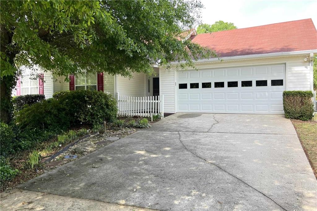 Welcome to this beautifully maintained 3-bedroom, 2-bath ranch home, full of charm and potential. Recent updates include a new HVAC system, fresh carpeting, and upgraded attic insulation, ensuring comfort and efficiency. The inviting living area features a cozy fireplace—perfect for relaxing evenings—while the screened sunroom and fully fenced backyard offer private outdoor enjoyment year-round. Kitchen appliances, including the washer and dryer, are included, making this home truly move-in ready. Lovingly cared for and thoughtfully updated, this home is ready for its next chapter.