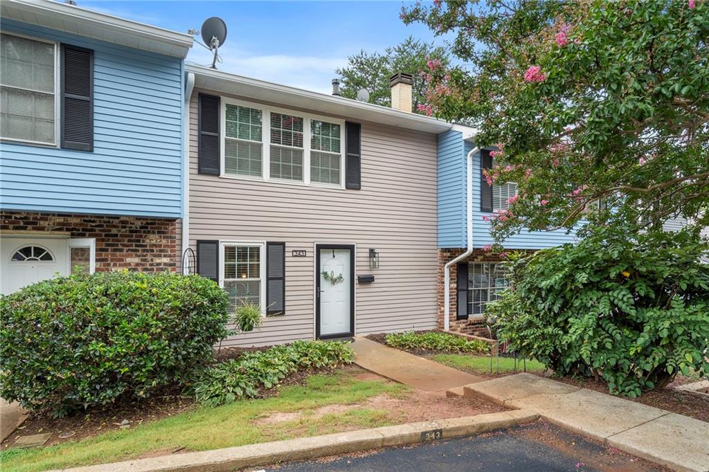 Welcome to 343 Leisure Court* Cute as a Button and Walking Distance to Tumlin Park which includes a Walking Path, Tennis and Pickle Ball Courts* This Condominium has 2 Years Young LVP Flooring throughout the home* Living Area has Ceiling Fan and Natural Light* Cozy Kitchen has Butcher Block Counters, White Cabinets, Tiled Backsplash, and Nice Stainless Refrigerator is included* A Powder Room is on the Main Level* Upstairs boasts 2 Spacious Bedrooms and a Full Bath* Extra Insulation has been added in the attic space* Rear concrete Patio for Sun Shiny Days and Grilling* 2 Designated Parking Spaces and Plenty of Guest Parking Just across the Parking Lot* A Community Pool is Close By* Great Price to be Close in to Marietta Square* Great for Investor, First Time Homebuyer or Anyone in Between* HOA Fees cover All Exterior Maintenance, Water, Sewer, Trash and Use of the Pool