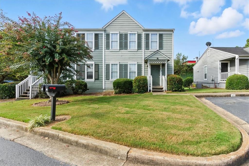 Welcome to this beautifully updated end-unit townhome, perfectly positioned just minutes from Kennesaw State University, Barrett Parkway, Marietta Square, and Kennestone Hospital. With no rental restrictions, this property is ideal for first-time homebuyers or savvy investors looking to expand their portfolio.
Step inside to a light-filled, open layout featuring fresh paint and new flooring. The spacious fireside family room flows seamlessly to a private rear deck, perfect for relaxing or entertaining. A convenient half bath completes the main level.
Upstairs, you'll find two generous bedrooms, each with its own private full bathroom, offering both comfort and functionality.
Outside, enjoy the peaceful view of a green space right from your deck—an ideal spot for soaking up the sunshine or hosting a summer BBQ. Plus, the community pool offers a great way to beat the heat during the warmer months.
For added convenience, two parking spots are located right in front of the unit.
Enjoy easy access to shopping, dining, schools, major highways, and more. Don't miss this move-in ready gem in a sought-after Marietta location!