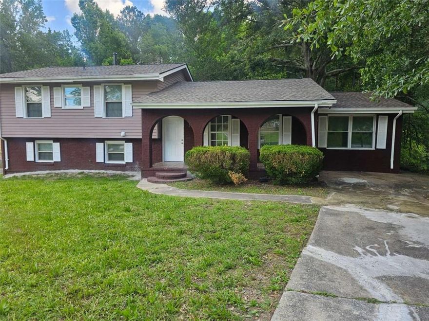 IF SPACE IS WHAT YOU NEED THEN YOU HAVE FOUND THE RIGHT ONE!! THIS PROPERTY BOAST SO MUCH BUT HERE ARE A FEW:  ROCKING CHAIR FRONT PORCH WHICH LEADS YOU TO THE FRONT DOOR WHICH OPENS TO A LARGE FAMILY ROOM THAT OPENS UP TO THE  LARGE KITCHEN WHICH HAVE  LOADS OF CABINET AND COUNTER SPACE AND A BUILT IN PANTRY.  THE GARAGE HAS BEEN CLOSED IN JUST FOR YOU TO HAVE A HUGE EITHER 5TH BEDROOM OR FAMILY ROOM OR MEDIA ROOM OR WORK OUT ROOM..SO MUCH    IF YOU GO UPSTAIRS TO THE MASTER  AND 2 OTHER JACK & JLLL SECONDARY BEDROOMS WITH LOTS OF STORAGE ROOMS, FULL AND HALF BATH ON THIS LEVEL...NOW  LET'S GO TO THE BASEMENT WITH A NICE SIZED BEDROOM WITH A FULL BATH, LAUNDRY ROOM AND A MEDIA ROOM OR OFFICE...THIS LEVEL LEADS OUT TO THE MASSIVE FENCED BACK YARD WITH A PATIO THAT IS APPROXIMATELY 15X22 AND IS COVERED SO YOU CAN BBQ EVEN WHEN ITS RAINING.... FAMILY GATHERINGS WILL NOT BE A PROBLEM THIS YARD IS SO LARGE THE KIDS CAN RUN AND  ENJOY THE OUTDOORS YOUR PETS HAVE NOT BEEN FORGOTTEN THIS YARD IS SO LARGE IT HAS A SEPARATE FENCED DOG RUN..COME ON IN AND SEE WHAT I'M TALKING ABOUT!!  NEW ROOF...HARDWOOD FLOORING..ALL KITCHEN APPLIANCES WILL REMAIN....