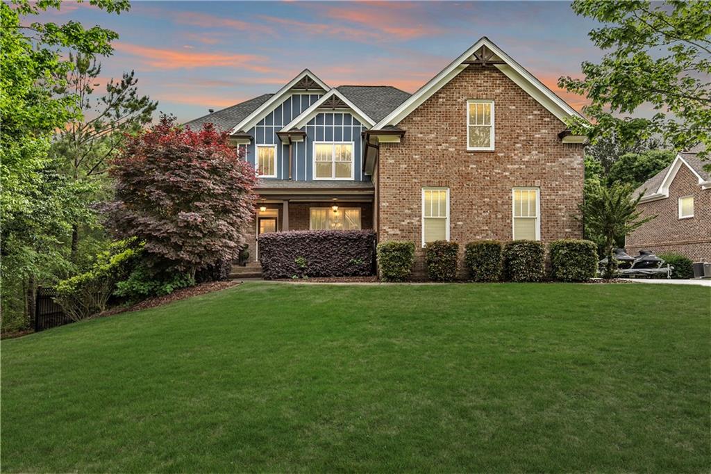 Welcome to your private retreat in the heart of Dacula’s Chapel Estates—where thoughtful updates and curated luxury come together. The
main level features sunlit living spaces with freshly refinished hardwood floors, fresh interior paint, and a beautifully upgraded kitchen with
professional-grade appliances and a smart refrigerator. The layout flows effortlessly into a light-filled sunroom and out to a custom outdoor
oasis featuring a saltwater pool, covered stone bar with built-ins and TVs, and an adorable shed perfect for storage or weekend projects.
Upstairs, the layout is just as practical as it is elegant, offering a convenient number of bathrooms to match the spacious bedrooms, along
with elevated details like tray ceilings that bring warmth and character to the home. Downstairs, the finished basement offers endless
possibilities—whether you keep it as the ultimate entertainment zone with a pool table, poker room, full, custom-made bar, and home
theater, or reimagine the private room and full bath as a guest suite, home office, or gym. Water-resistant flooring was thoughtfully chosen
to suit indoor-outdoor living. Major upgrades—including a newer roof, AC unit, gutters, and full exterior paint—offer peace of mind for
years to come. The fenced backyard glows with LED accents, and the three-car garage provides space for hobbies or storage. Ideally
located just minutes from Hwy 316 and I-85, with easy access to everyday conveniences like Publix, shopping, and the exciting new
Harbins Road development featuring restaurants, retail, and more—this home is the one you’ve been waiting for. Schedule a showing
today!