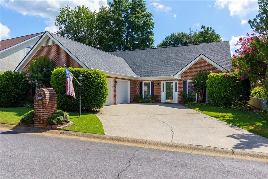 Location-Location-Location - Bridgegate! Beautifully maintained 3 bedroom - 2.5 bath home located in the highly sought after Walton School District! Updated kitchen with a large breakfast area equipped with loads of cabinets and extra counter space to utilize for all your serving needs. You'll love the huge great room with the cozy fireplace, ideal for entertaining. From there you'll find French doors that open up to a bright sunroom along with a patio. Included is a shed for all your outdoor tools, as well as, an enclosed private fenced-in back yard! You'll find 3 closets in the primary bedroom! The primary bedroom has its own private door to the sunroom. This charming, traditional home has been freshly painted throughout, making it move-in ready! Conveniently located in the heart of East Cobb where you will find prime shopping, dining and entertainment. Just minutes to I-75, downtown Marietta or a quick trip to East Cobb Park. Go and show! This won't last long!