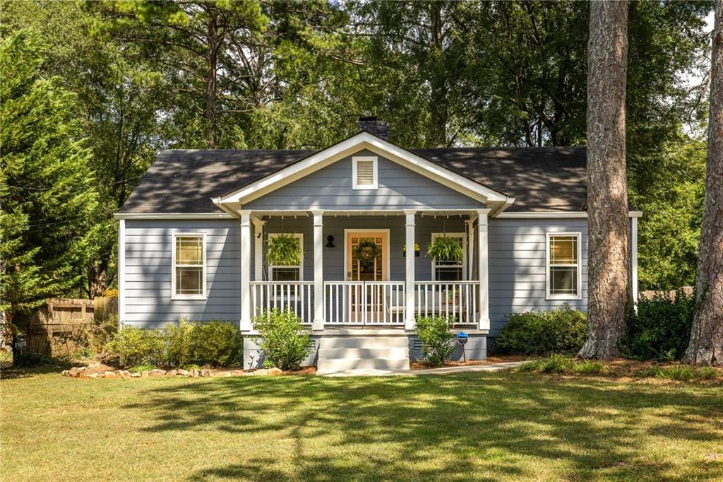 Open Sunday 2-4pm! Get the latest info at 49CandlerRd.com This classic East Lake cottage is situated on a large .3 acre lot with easy off-street parking. Conveniently located close to everything in Decatur and nearby Dearborn Park complete with playground, trails, and creek. You don't need to wait to buy because Highland Mortgage is offering a 1% lower interest rate on your mortgage for the first year! In addition, this property already has a Homestead Exemption discount on property taxes.
Step inside and you’ll be greeted with a fully renovated and sunkissed home with charming details. Open living spaces make it easy for entertaining, too. Side door from kitchen has steps down to grilling patio for dining outside. Â
Get swept away by the dreamy primary suite with oversized walk-in closet and primary bathroom with huge shower and extra long double vanity with granite countertop. Primary suite opens directly onto a private deck with views of the deep rear yard. You'll feel miles away from the city with your own private oasis of a rear yard! Enjoy the shade from the Atlanta tree canopy and step into your flat yard--ready for outdoor morning yoga or fun yard games with friends. Host magical outdoor parties under the festive string lights.
Double your living space with all the outdoor rooms! Home and property lovingly maintained and ready for you to move in and immediately enjoy. Even the kitchen appliances and wood blinds stay!
Location: Property is located at the edge of East Lake where the neighborhood borders City of Decatur. Conveniently located within walk and roll distance to Oakhurst and Dearborn Park. Easy to get around the city, too. 5-minute drive to downtown Decatur or I-20.
Explore this special neighborhood with listing agent during a Neighborhood Walk on Saturday morning August 2nd. (Meet at the Dearborn Park playground at 9am). (FYI! Map on Zillow is incorrect. Please refer to map in listing photos and use NE on Google Maps)