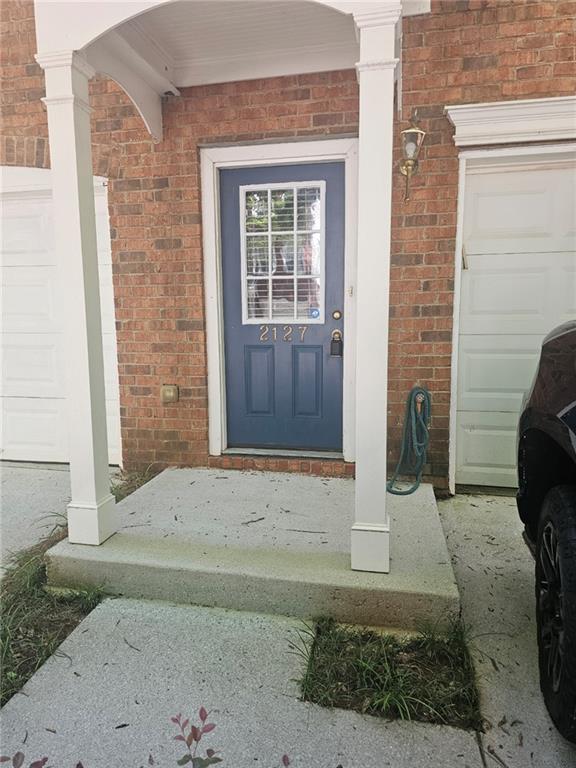 Available for immediate move-in! $200 off first month rent with a lease signed by the end of July.Beautiful 3-story brick/frame townhouse in quiet community. Lots of room. Spacious family room with fireplace. Large kitchen with breakfast area, bar & stained cabinets. Huge master bedroom. Walk-in closets. Bonus room on terrace level great for home office or gym. 1-car garage. Gated community. Walking distance to restaurants, shopping, grocery store and MARTA. Near I-285 and North Lake Mall. Income requirement 3x monthly rent!! $55 application fee for all occupants over the age 18.