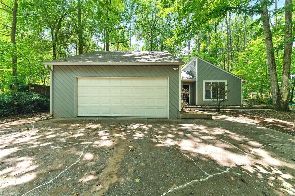 Welcome to 2041 Kramer Way in beautiful Marietta, Georgia!
This charming home is nestled in a quiet neighborhood in Marietta. This 1,624 square foot home features 3 bedrooms and 2 bathrooms on a spacious .47 acre lot.
Step inside to find an open concept living area with plenty of natural light supplied by the courtyard at the center of the home. The kitchen boasts granite countertops and stainless steel appliances.
Out back, enjoy the private, fenced yard - great for summer barbecues or gardening enthusiasts.
Located in the highly-rated Cobb County School District, this home is close to shopping, dining, and recreation at East Cobb Park. Easy access to I-75 makes commuting a breeze.
Don't miss this opportunity to make 2041 Kramer Way your new home! Schedule a showing today.
